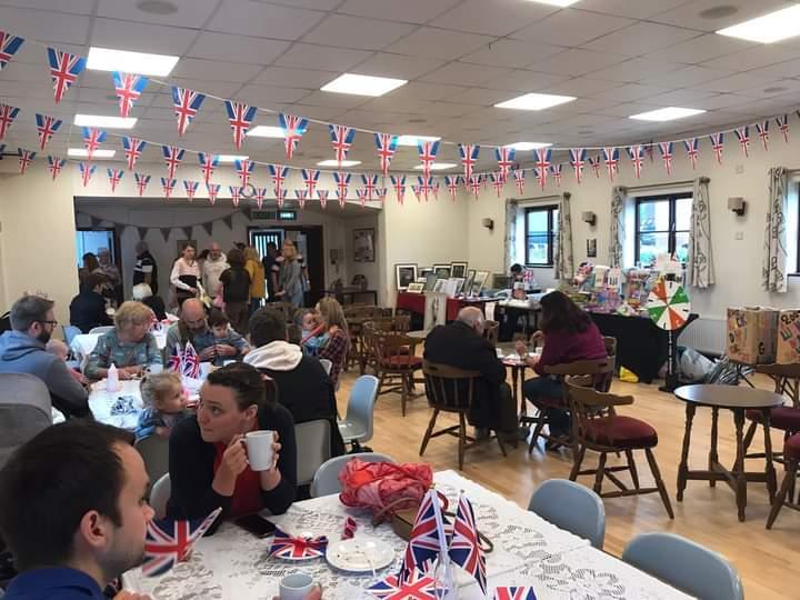 Customers having an early Tea and cake!